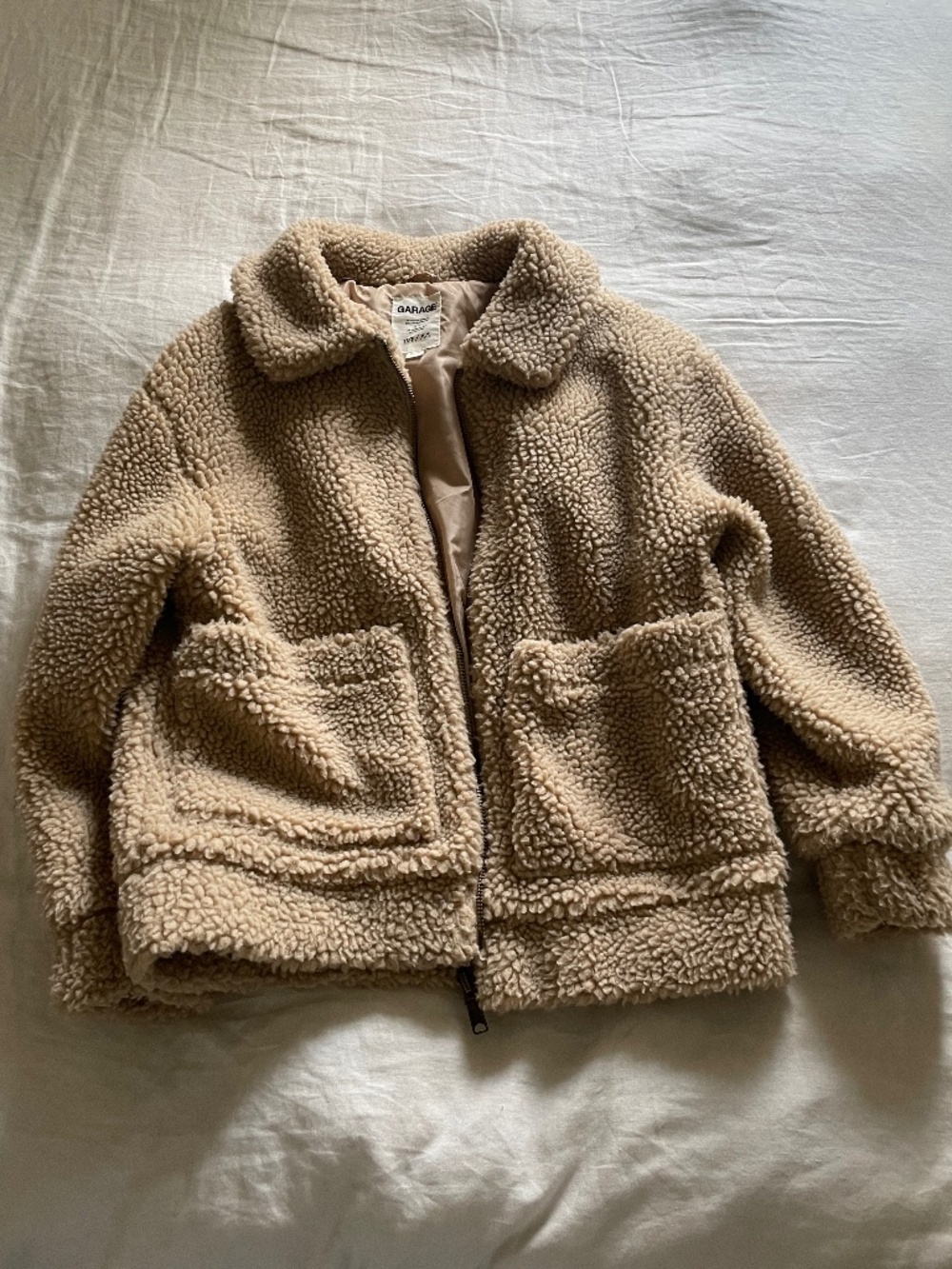 Oversized slouchy tan teddy sherpa zip up coat jacket with front pockets